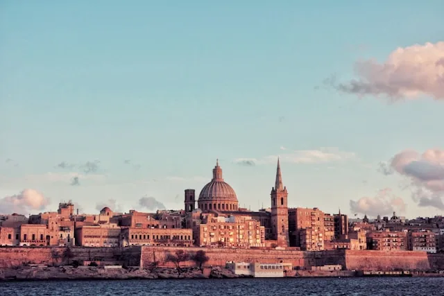 Valletta skyline at sunset with the Carmelite dome, Malta