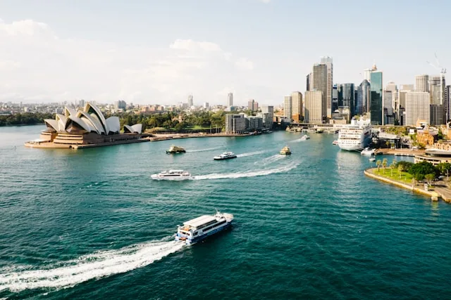 Sydney Opera House and ferries on the harbour, Australia