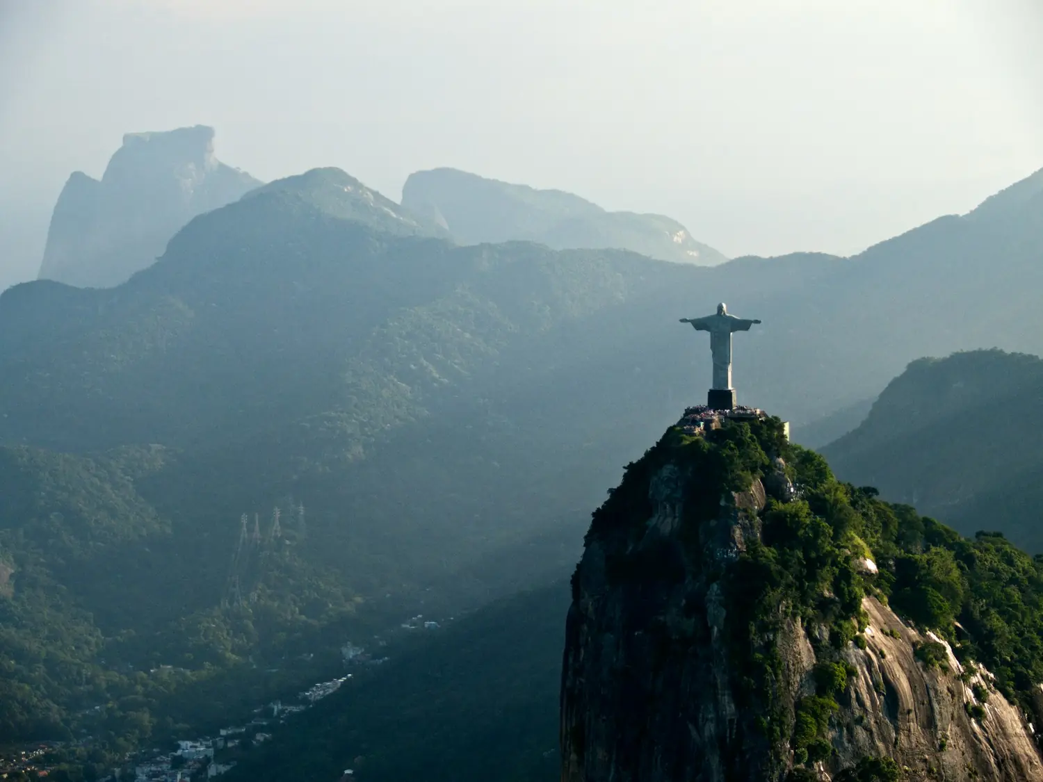 Christ the Redeemer on the Corcovado mountain above Rio de Janeiro, with the Tijuca forest and Pedra da Gavea behind, Brazil