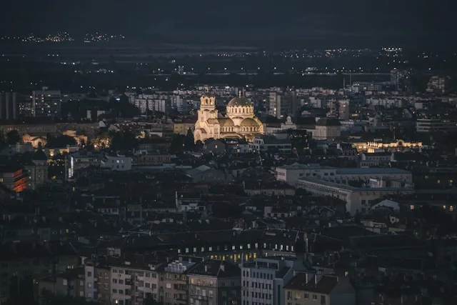 Alexander Nevsky Cathedral over the Sofia skyline at night, Bulgaria