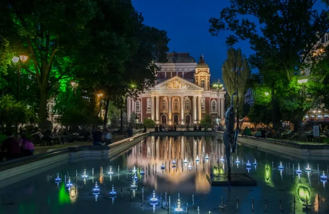 Ivan Vazov National Theatre and fountains in Sofia at night, Bulgaria