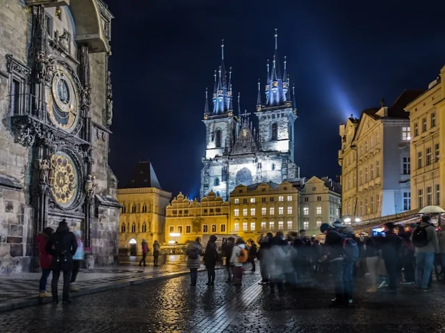 Old Town Square and Tyn Church in Prague illuminated at night, Czech Republic