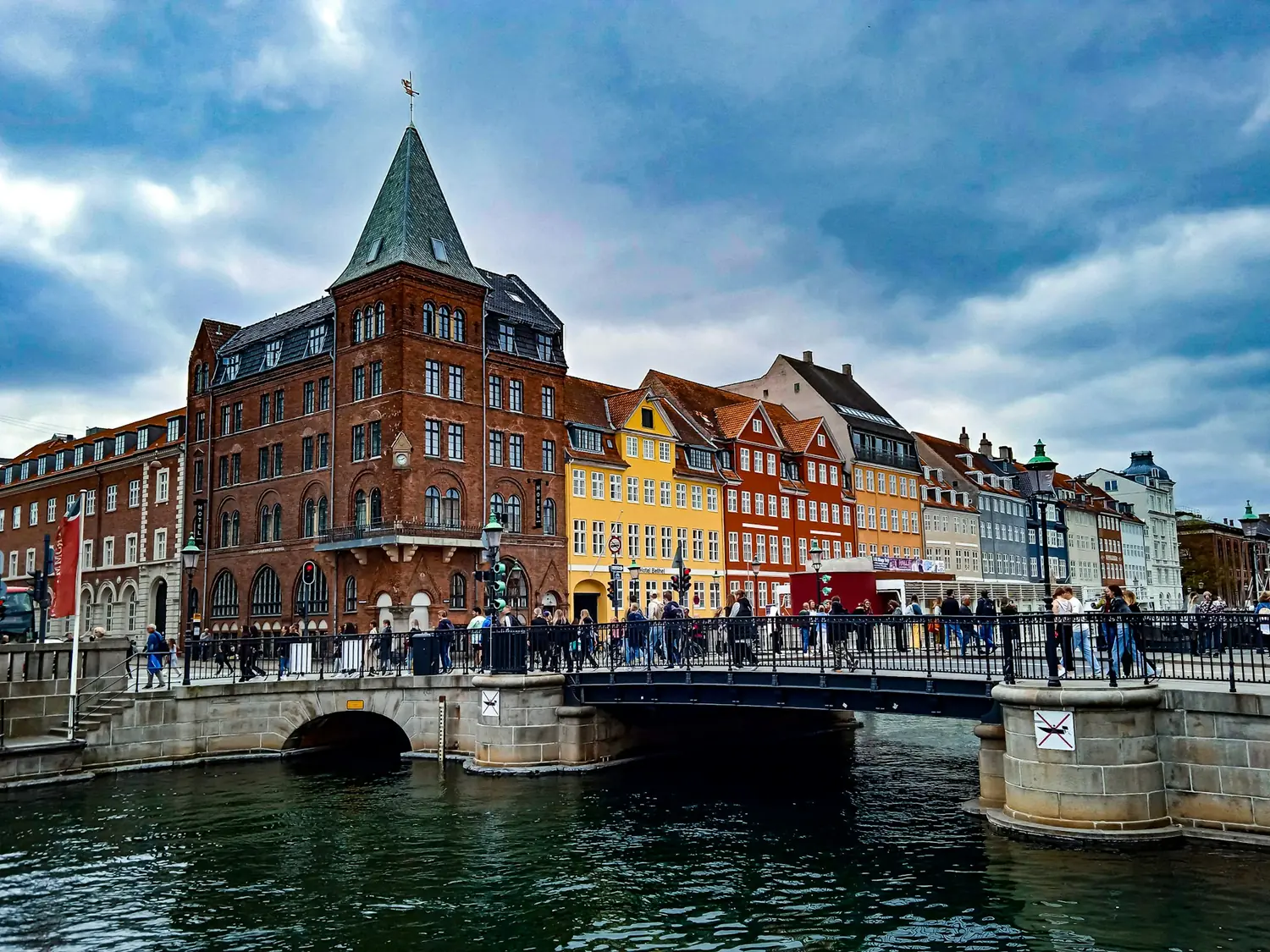 Colourful townhouses and a canal bridge in central Copenhagen, Denmark