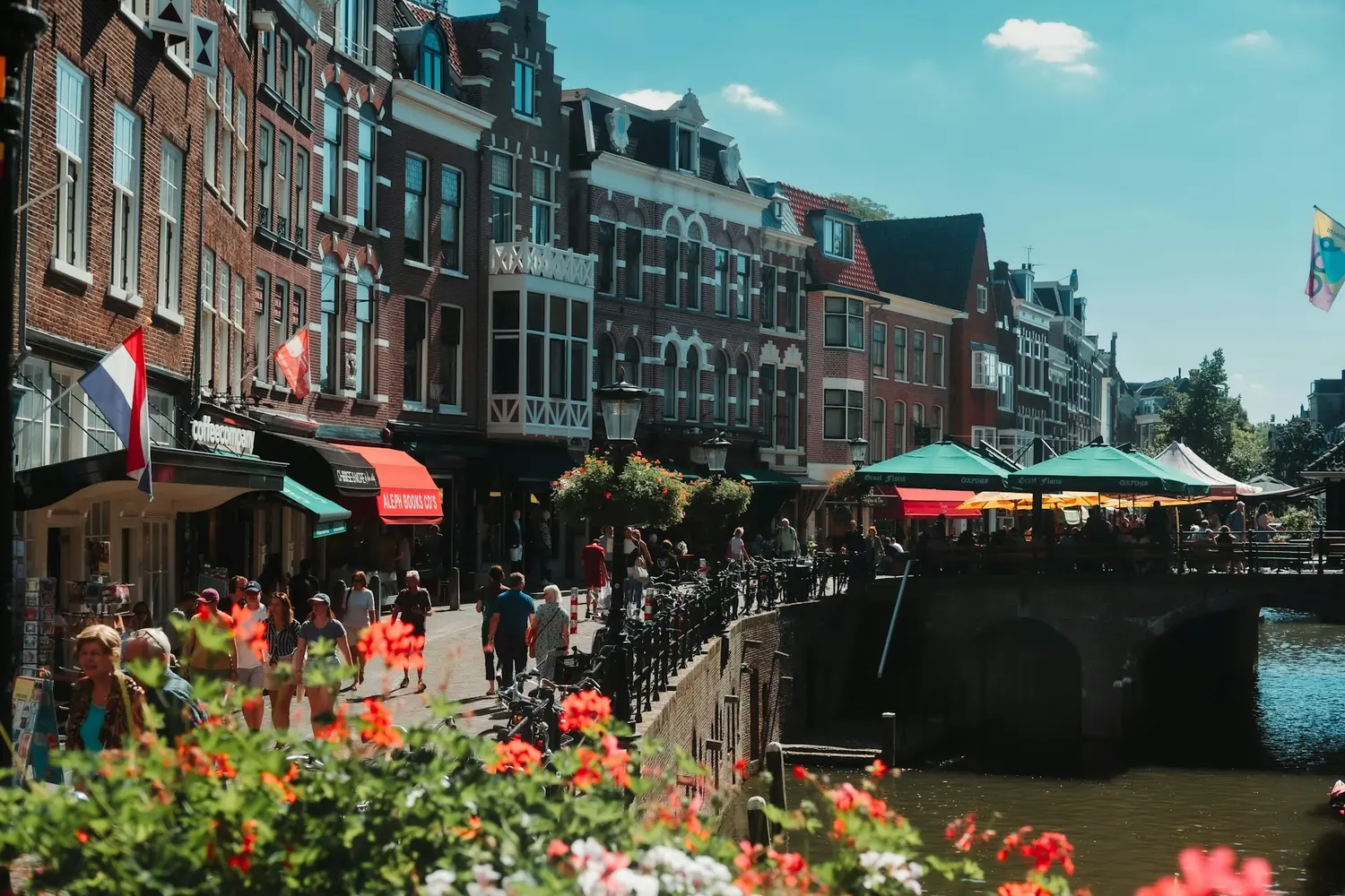Canalside cafes, bicycles and gabled houses along a canal in Utrecht, the Netherlands
