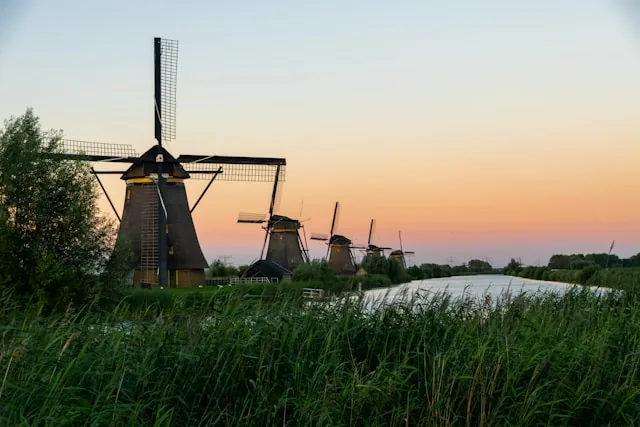 The historic Kinderdijk windmills at sunset, the Netherlands