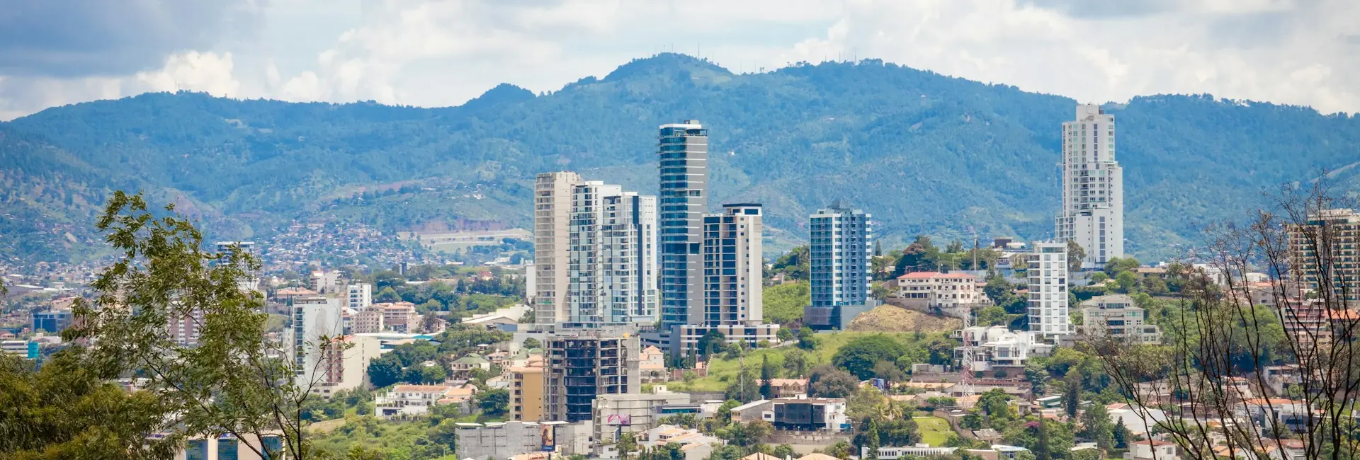 High-rise buildings of Tegucigalpa with the mountains around the city behind, Honduras
