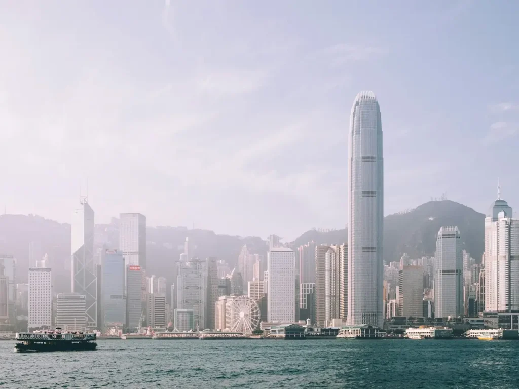 A Star Ferry crossing Victoria Harbour in front of the Central skyline, Hong Kong
