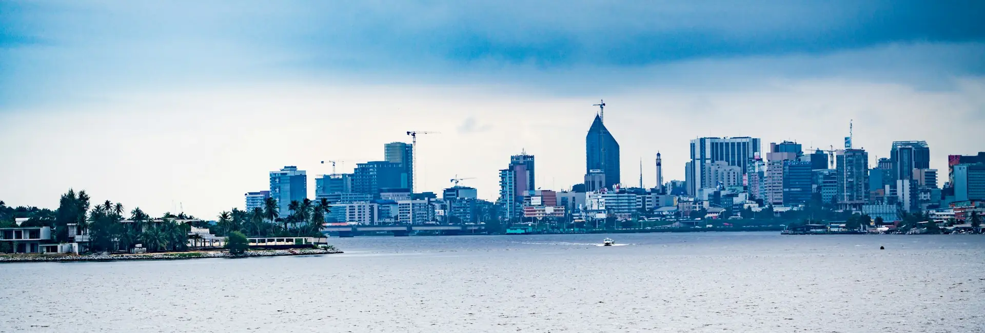 The Plateau business district skyline seen across the Ébrié Lagoon, Abidjan, Ivory Coast