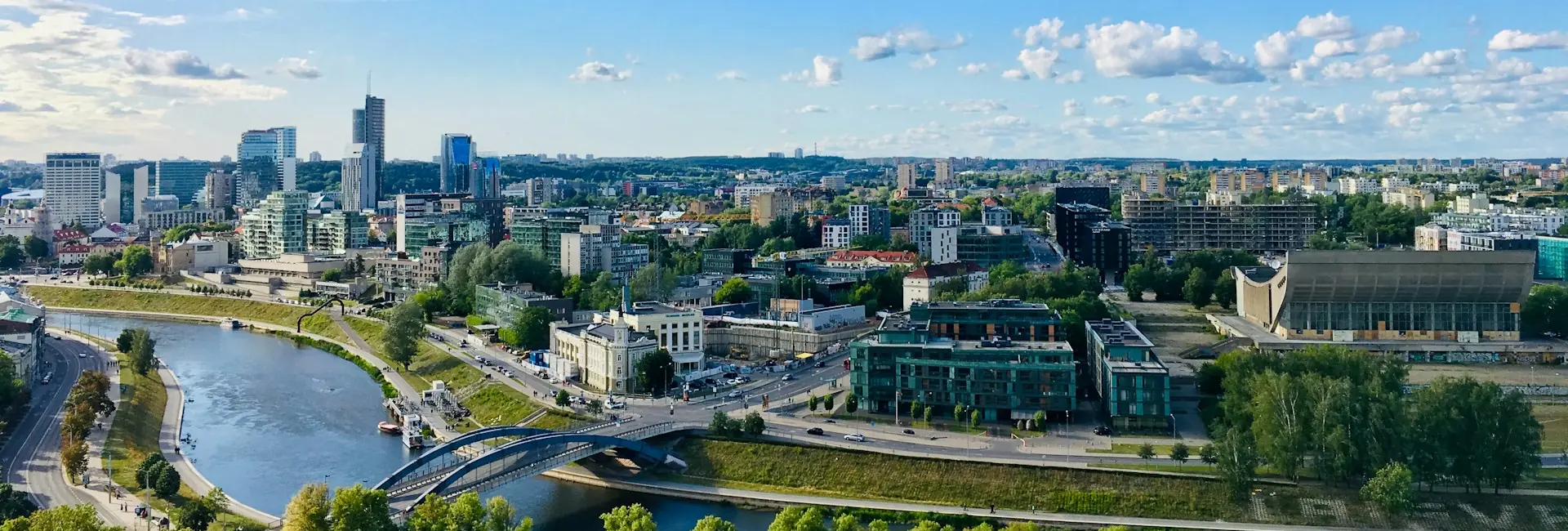 The business district of Vilnius across the Neris River, with the White Bridge in front, Lithuania