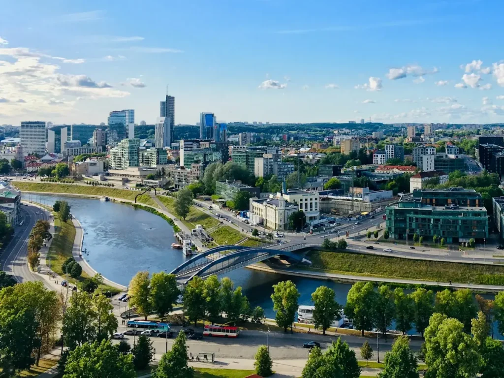 Office towers of the Vilnius business district above the Neris River and the White Bridge, Lithuania