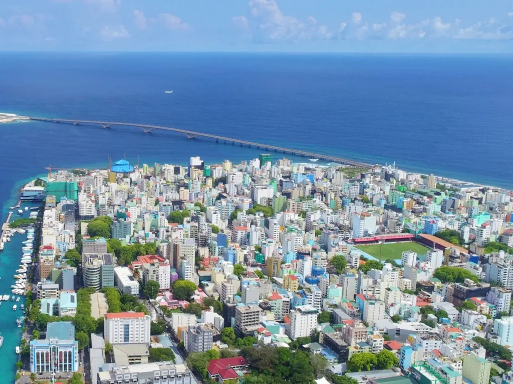 City blocks of Male beside the Sinamale Bridge and the national football stadium, Maldives