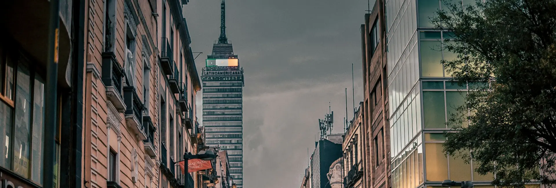 The Torre Latinoamericana rising above the buildings of Madero Street in the historic centre of Mexico City, Mexico