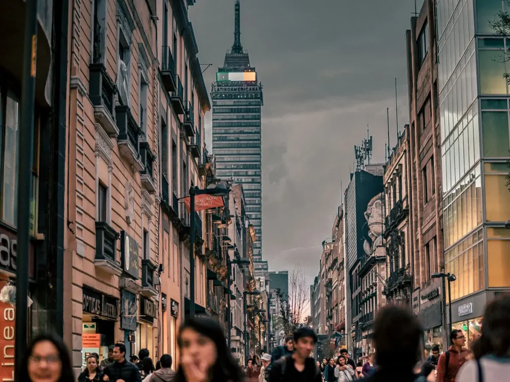 People walking along Madero Street with the Torre Latinoamericana behind, Mexico City, Mexico