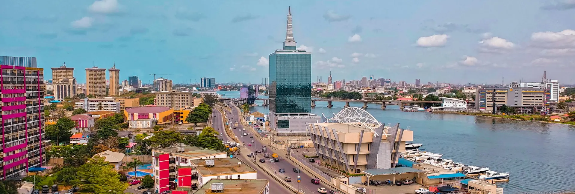 Ozumba Mbadiwe Avenue running past the Civic Centre Towers beside the lagoon on Victoria Island, Lagos, Nigeria