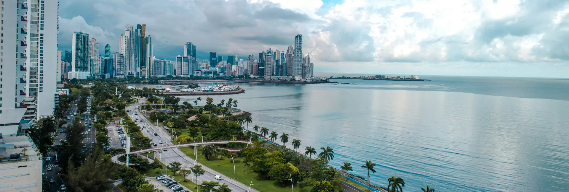 Aerial view of the Cinta Costera along Avenida Balboa, with the Panama City skyline and the Bay of Panama, Panama