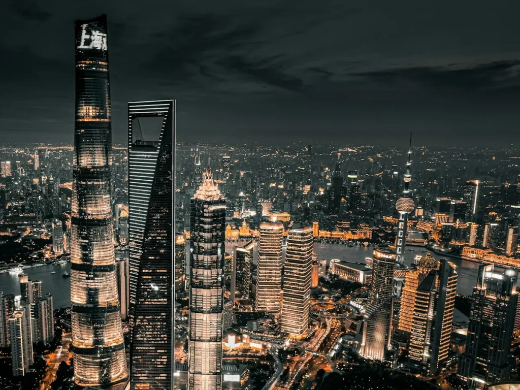 Shanghai Tower, the Shanghai World Financial Center and the Jin Mao Tower above the Huangpu River at night, Shanghai, China
