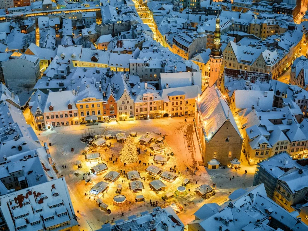 Christmas market on Town Hall Square in the Old Town of Tallinn on a winter night, Estonia