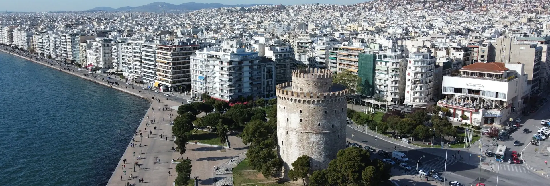 Aerial view of the White Tower and the waterfront promenade of Thessaloniki, Greece